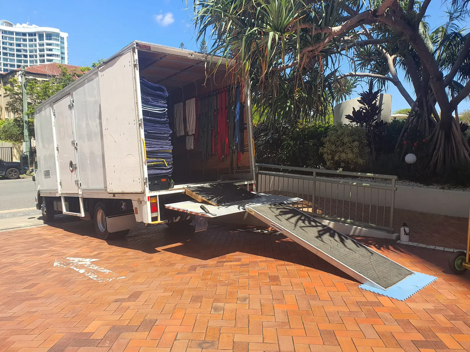 Removal truck loaded with protective blankets and moving equipment